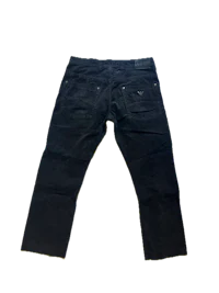 a pair of black jeans on a black background