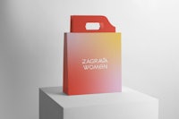 a shopping bag with the word zara women on it
