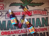 three bottles of cbd oil on a sack