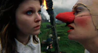 a woman with a clown nose and a woman with a clown nose