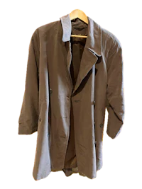 a brown jacket hanging on a hanger
