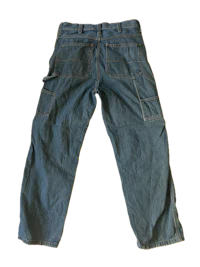 a pair of blue jeans on a black background