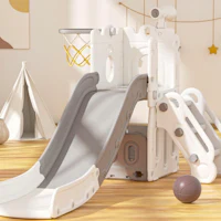 a children's play set with a slide and a ball