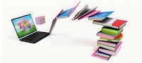 a laptop is surrounded by a stack of books