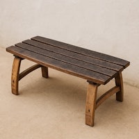 a wooden bench with a slatted top