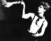 a man is holding a bat in his hands