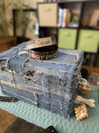 a piece of denim sitting on top of a table