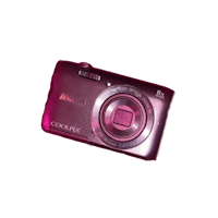 nikon digital camera on a black background