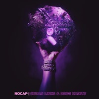 a hand holding a purple ball with the words'nocap' written on it