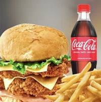 a chicken burger with fries and coca cola