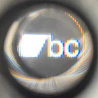 a magnifying glass with the bbc logo on it