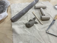 clay and tools on a table