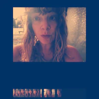 a photo of a woman with a hat on her head