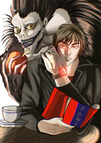 a man and a woman sitting at a table with a book