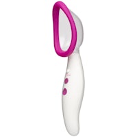 a pink and white electric shaver on a white background