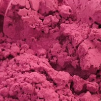 a close up of a pink powder