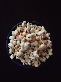 popcorn on blue ceramic bowl