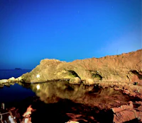 a rock formation in the water