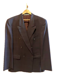 a brown blazer hanging on a hanger