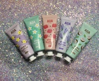 four tubes of ada hand cream on a glittery surface