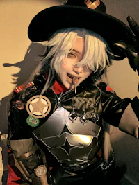 a female cosplayer in a black outfit holding a hat