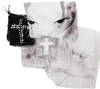 a piece of paper with a cross on it