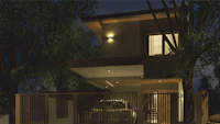 a 3d rendering of a house at night