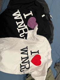 three t - shirts that say i love win