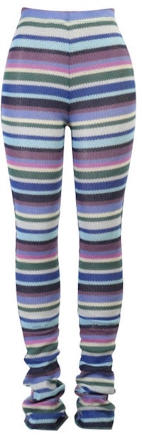 the legs of a woman wearing striped leggings