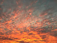 a colorful sunset with clouds in the sky