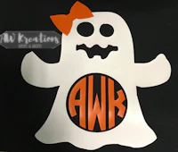 a ghost with an orange bow on a black background