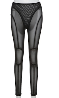 a pair of black mesh leggings on a mannequin