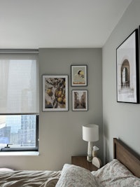 a bed in a room with a view of a window