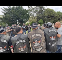 a group of bikers wearing motorcycle jackets