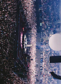 an aerial view of a large crowd at a concert