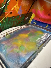 a plate with a purple and blue design on it