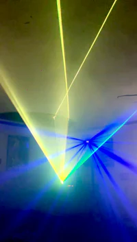 a room with red and purple lights in the ceiling