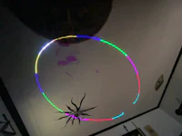 a room with colorful lights hanging from the ceiling