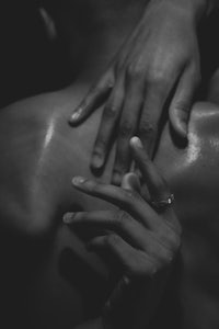 a black and white photo of a person getting a massage