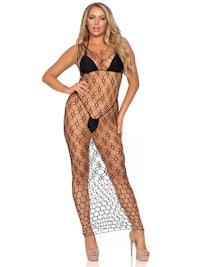 a woman wearing a black fishnet maxi dress