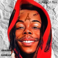 a man in a red hoodie with a smile on his face