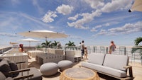 a rendering of a rooftop deck with furniture and umbrellas