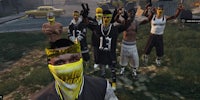 a group of people wearing yellow bandanas in a video game