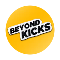 beyond kicks logo on a yellow background