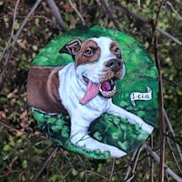 a painting of a dog laying in a tree