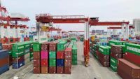 an aerial view of a container port with many containers