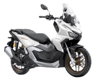 the white and black motorcycle is parked on a white background