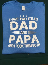 a t - shirt that says i have two titles dad and papa and rock them both