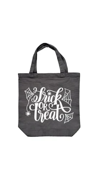 a gray tote bag with the words trick or treat on it
