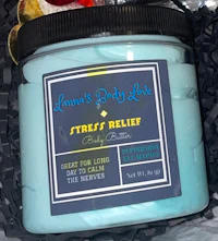 a jar of lotion with a blue label on it